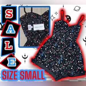 NWT: Unique Vintage - Black Floral Romper (SIZE SMALL - 4).